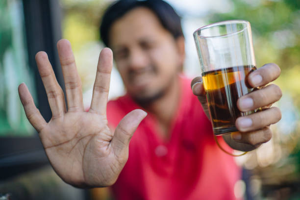 istock Stop alcohol concept. man refuse to drink alcohol. 1200834136