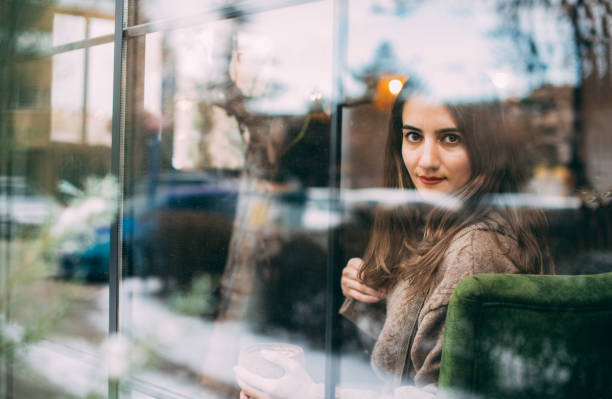 istock Emotional Woman Behind Glass 1200834711