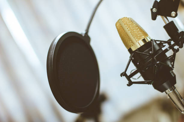 istock Vintage with golden condenser microphones . 1200835668