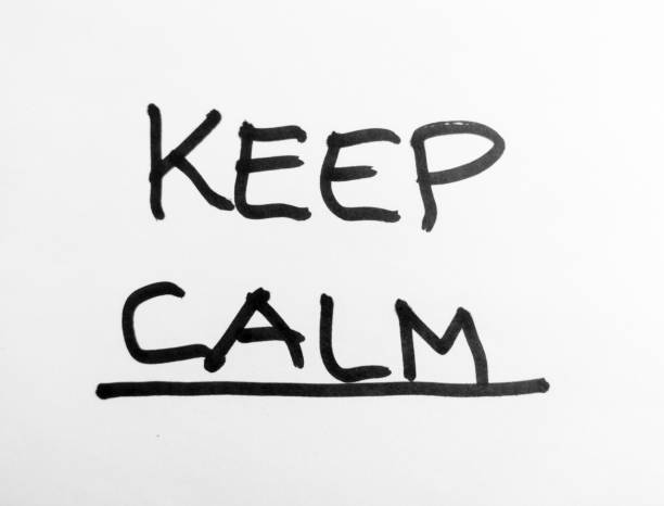 Hand written words - keep calm - black marker on white paper