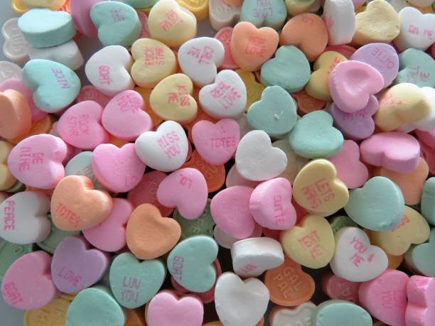 istock Heart-shaped conversation candies, background, copy space 1200840322
