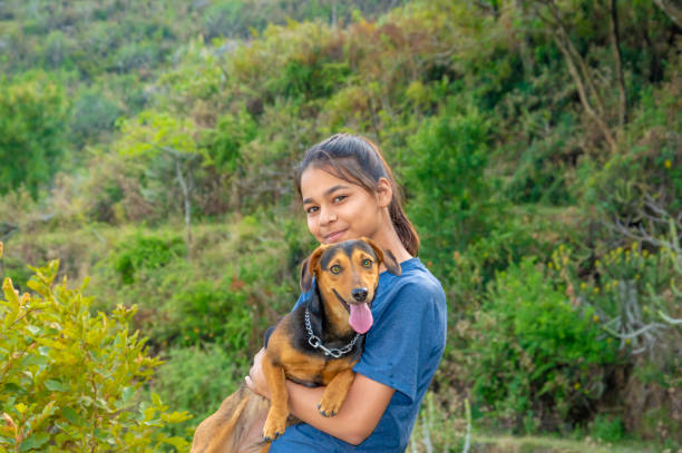 istock A girl with her cute doggie 1200840938