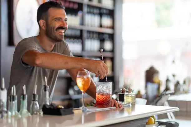 Photo of Bartender Making Cocktails