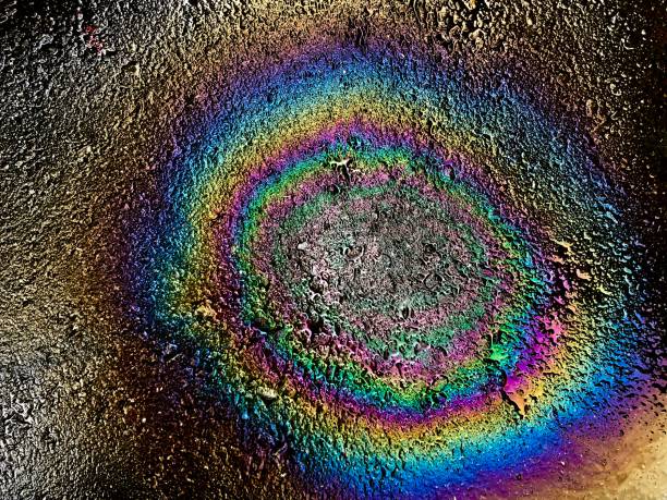 istock Oil spill on asphalt road 1200847164