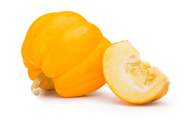 istock Golden pumpkin isolated on a white background. Fancy pumpkin clipping path. 1200849360