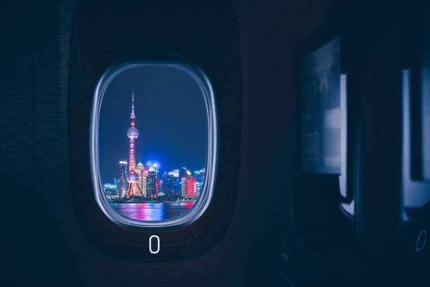 istock Shanghai seen through an aircraft window at sunset 1200850369