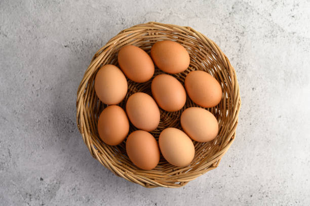 istock Top view Organic brown eggs several in a wicker basket, preparing preparing for cooking food or dessert, copy space 1200857312