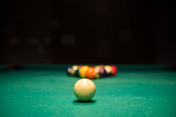istock Billiards table with balls and cue ball set up for break 1200862738