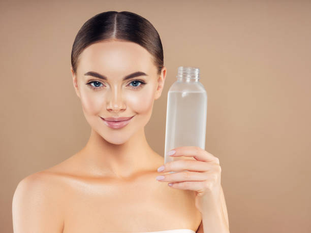 istock Girl holding a water bottle 1200863663