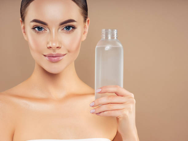 istock Girl holding a water bottle 1200863676