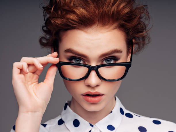 istock Beautiful girl with eyeglasses 1200863992