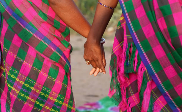 istock Tribal Indian woman holding hands while dancing 1200870106