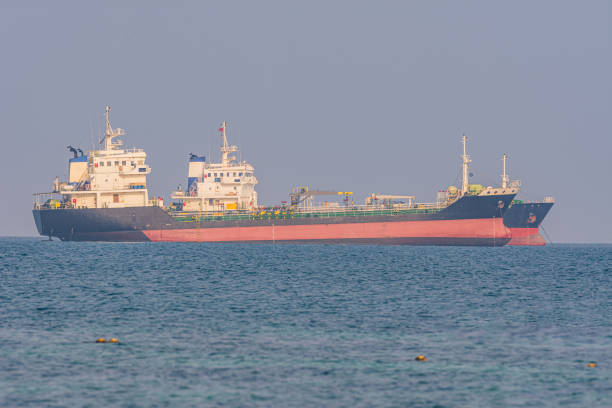 istock The cargo ship floated in the sea during the daytime. 1200876929