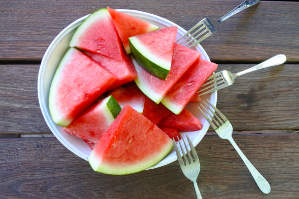 istock Fresh watermelon slices served in a white plate 1200877051