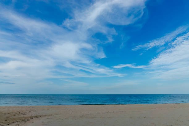 istock Nobody on the beach with blue sky and clouds 1200879841