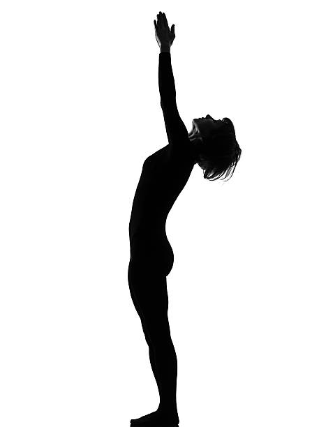 istock one woman sun salutation yoga surya namaskar pose 120088006