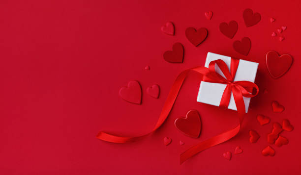 istock Red Valentines day background. Gift box and mixed hearts top view. Flat lay. 1200883116