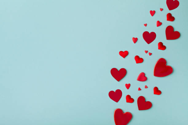 istock Valentine day background. Many red hearts. Flat lay. 1200883121