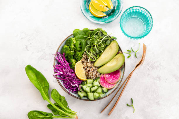 istock Spring detoxifying vegetarian salad  with quinoa red cabbage and sprouts, top down view 1200895819