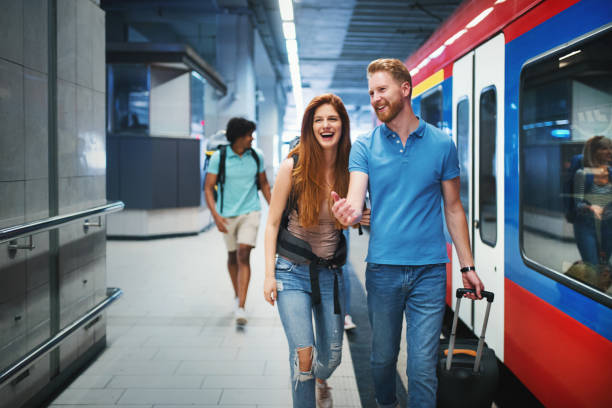 istock Group of young people at a train station. 1200896405