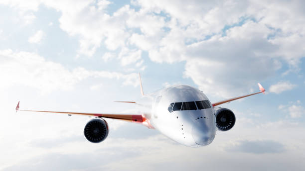 istock Commercial airplane flying on sunny blue sky. 1200896435