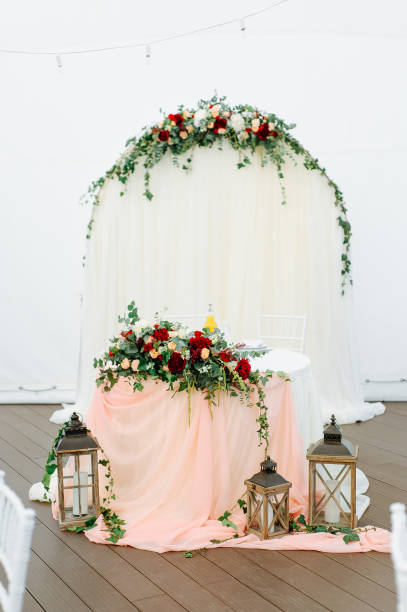 istock Beautiful flowers on table in wedding day 1200898647