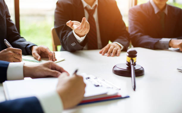 group of business people and lawyers discussing contract papers ,consultation between a male lawyer and businessman concept - declaring bankrupcy imagens e fotografias de stock