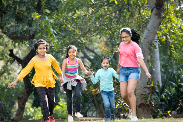 istock Little children at park 1200899207
