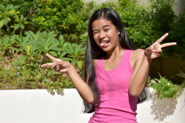 istock A Goofy Youthful Diverse Female 1200903393
