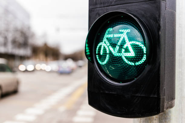 istock Traffic light for cyclists. Green light for bycicle lane on a traffic light. 1200905337