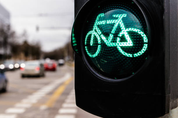 istock Traffic light for cyclists. Green light for bycicle lane on a traffic light. 1200905341