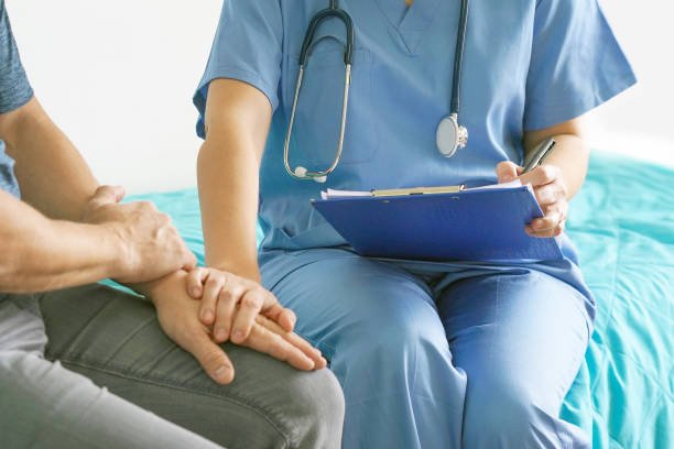 istock Doctor holds the patient's hand. 1200905561