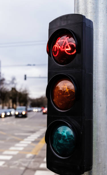 istock Traffic light for cyclists. Red light for bycicle lane on a traffic light. 1200905577