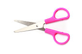 Pink scissors isolated on white background
