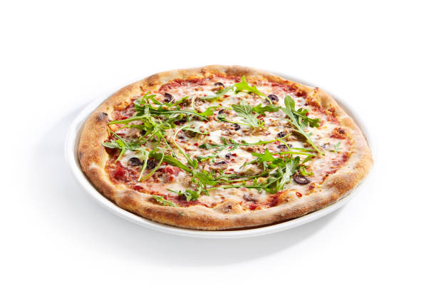istock Pizza with Tuna, Olives and Arugula Top View Isolated 1200909527