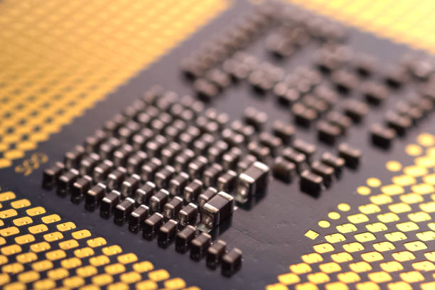 istock Contacts on the surface of central processor. Elements of electr 1200909602