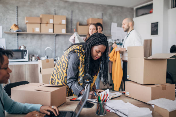 istock Diverse people arranging customers orders for drop shipping 1200910911