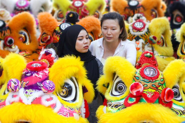 istock Chinese New Year: 18 Lion Dance Heads on Display 1200911399