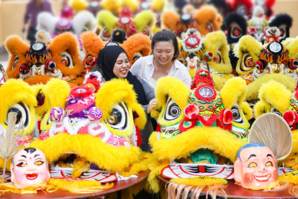 istock Chinese New Year: 18 Lion Dance Heads on Display 1200911408