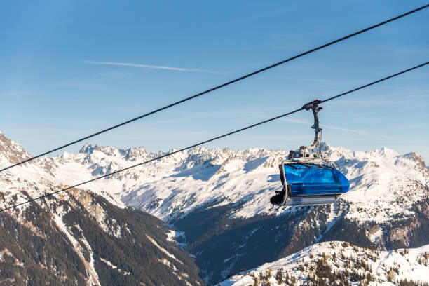 Ski cable lift in the Alps. Austrian Alps ski resort.