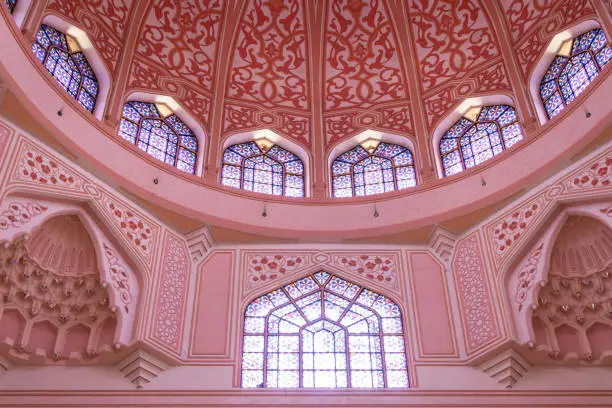 Interior circle dome design of Putra Mosque faces the scenic Putrajaya Lake. It is one of the most visited landmarks in Putrajaya, Malaysia.