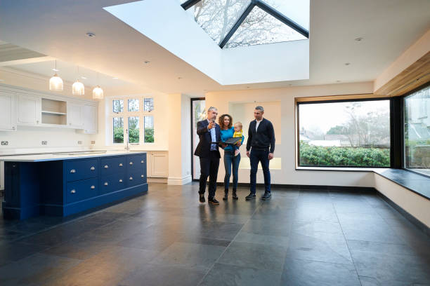 istock estate agent with family 1200913757