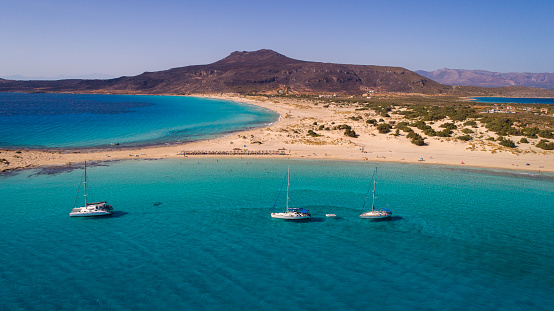 Aerial view of Elafonisi beach on south Peloponnese. Natural landscape, beautiful lagoon, amazing color of water and sand beaches made this place very popular