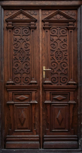 istock antique brown wooden door 1200914027