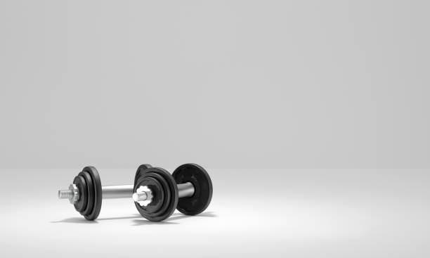istock sport dumbbells symbol 1200914058