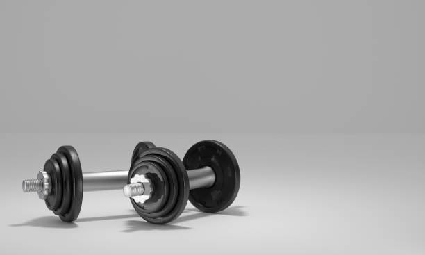 istock sport dumbbells symbol 1200914079