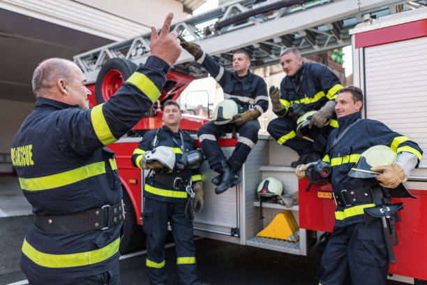 istock Chief fire officer conducting safety briefing with his team 1200914257