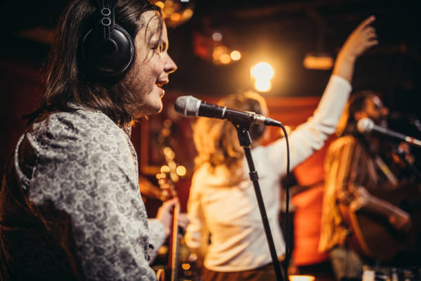 istock Music band performing on stage 1200915059