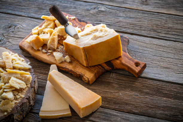istock Parmesan cheese on cutting board 1200916198