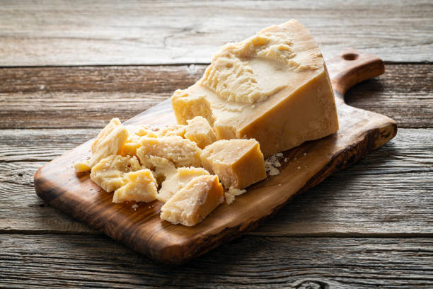istock Parmesan cheese on cutting board 1200916349